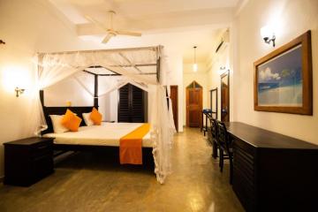 Отель International Beach Hotel & Restaurant Шри-Ланка, Хиккадува, фото 16