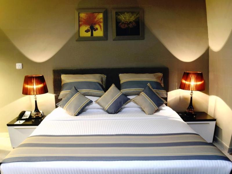 Magnum Hotel & Suites West Bay