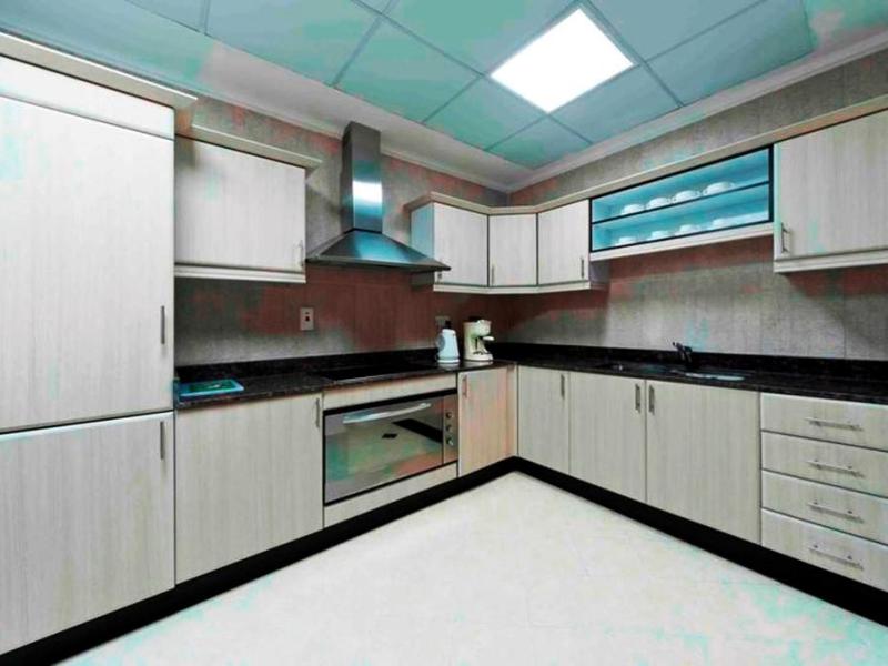 Magnum Hotel & Suites West Bay