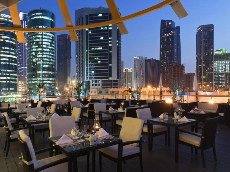 Magnum Hotel & Suites West Bay