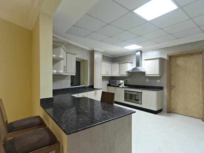 Magnum Hotel & Suites West Bay