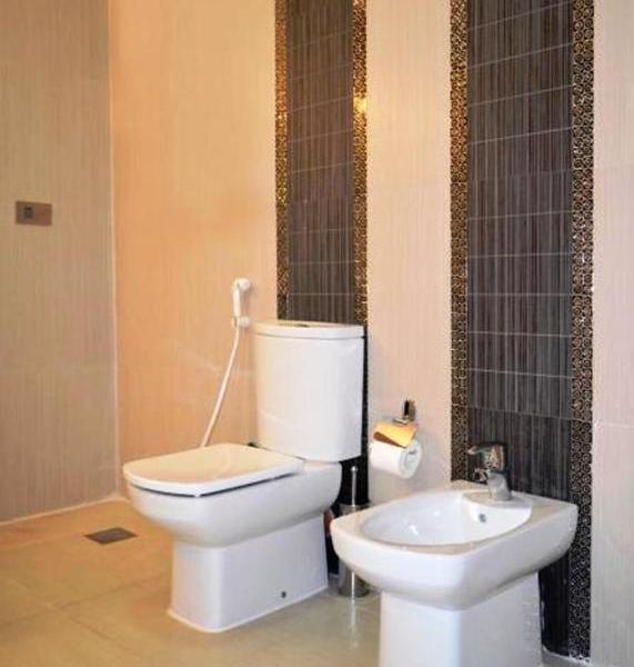 Magnum Hotel & Suites West Bay