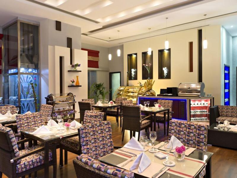 Magnum Hotel & Suites West Bay