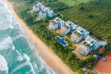 Отель Oceanfront Condominiums - Nilaveli Шри-Ланка, Нилавели, фото 1