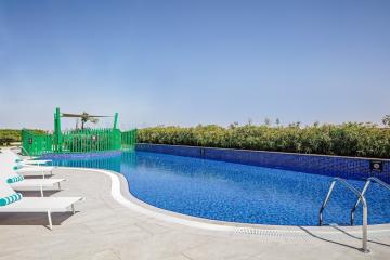 Отель Holiday Inn & Suites Dubai Science Park ОАЭ, Аль Барша, фото 9