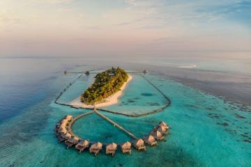 Отель Komandoo Maldives Island Resort Мальдивы, Лавияни Атолл, фото 1