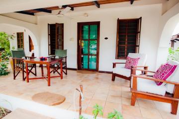 Отель Flame Tree Cottages Танзания, Нунгви, фото 13