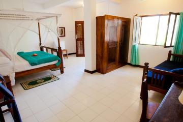 Отель Flame Tree Cottages Танзания, Нунгви, фото 5