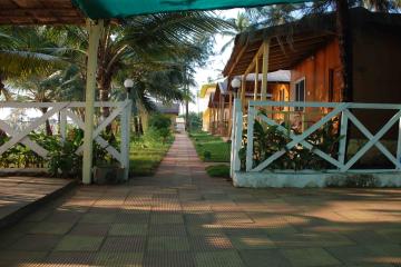 Отель Sea Paradise Beach Cottages Индия, Мандрем, фото 9